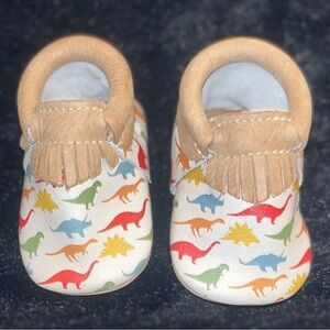 Freshly picked dinosaur moccasins for infants Size 1